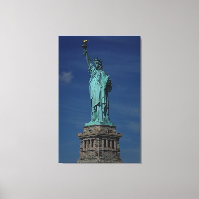 The Statue of Liberty on Pedestal with Blue Sky Canvas Print (Front)