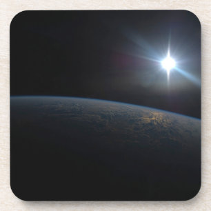 The Sun Setting Over Earth's Horizon. Beverage Coaster