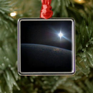 The Sun Setting Over Earth's Horizon. Metal Ornament