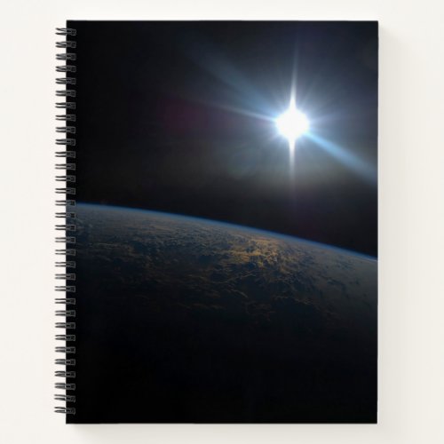 The Sun Setting Over Earths Horizon Notebook