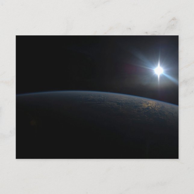 The Sun Setting Over Earth's Horizon. Postcard (Front)