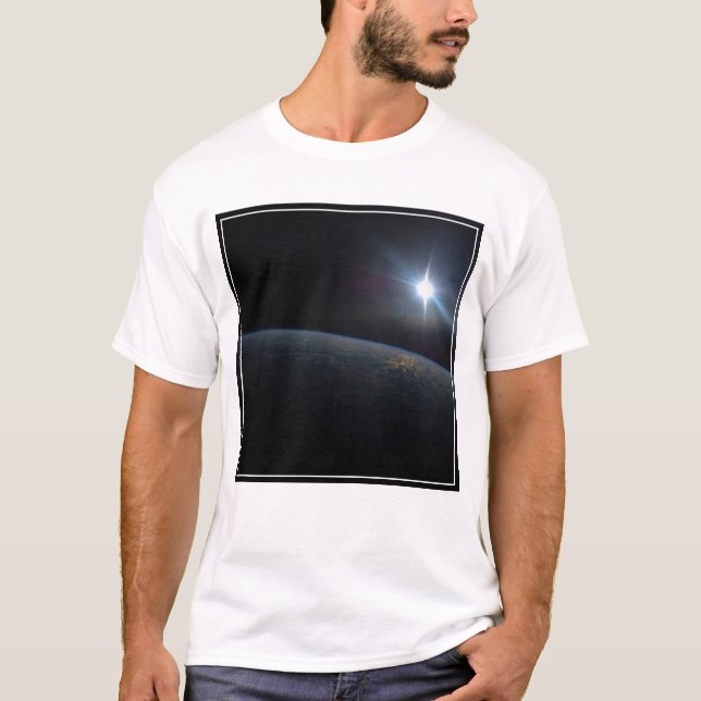 The Sun Setting Over Earth's Horizon. T-Shirt (Front)