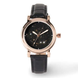 The Sunburst Arc In A Massive Galaxy Cluster Watch