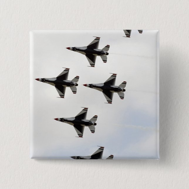 The Thunderbirds form a 6-ship Delta formation Button (Front)