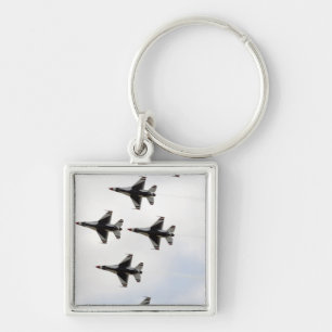 The Thunderbirds form a 6-ship Delta formation Keychain