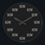 The Time is NOW wall clock: White letters on black Large Clock<br><div class="desc">Embrace immediacy and live in the present moment. There's no day like today, my friend. And there is no time like... NOW. Good for: newlyweds and divorcees, bosses and subordinates, sharks and office drones, rabbits and mad hatters, kindergarten teachers and physicists, toddlers and nannies, fresh grads and retirees, news editors...</div>