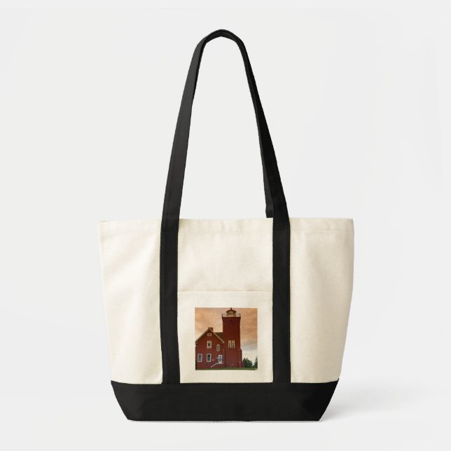 The Two Harbors Lighthouse overlooking Agate Bay Tote Bag (Front)