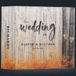 The Two Lovers Carved Trees Wedding Photo Album 3 Ring Binder<br><div class="desc">The Two Lovers Carved Trees Fall Forest Design with soft pretty wilderness photography image. A rustic outdoor landscape scene for an adventurous lodge, mountain, retreat wedding, in orange, yellow golds, grays, brown and white. Featuring 2 oak trees with hearts and couple's initial letters carved into them surrounded by a birch...</div>