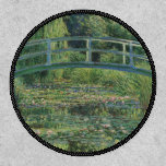 The Water-Lily Pond, Landscape Oil Painting, Monet Patch<br><div class="desc">Claude Monet, 1899, GIverny, France oil on canvas mostly monochromatic fine art landscape impressionist oil painting depicting a serene tranquil peaceful pond full of soft pale pink blooming water lilies and green lily pads, with a green bridge over it. weeping willows and other trees can be seen in the background...</div>