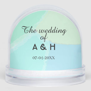 The wedding of add couple name initial letter date snow globe