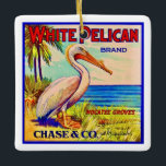 The White Pelican Ceramic Ornament<br><div class="desc">The white pelican is such an admirable bird.  We found this vintage,  retro fruit crate label featuring him and repurposed the label on a ceramic ornament.</div>