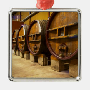 The wine cellar winery with big old wooden casks metal ornament