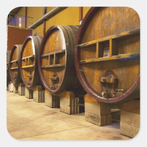 The wine cellar winery with big old wooden casks square sticker