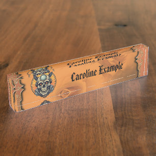 The winged skull. desk name plate
