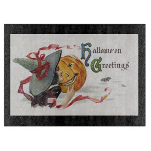 The Witch's Kiss: a Jack o Lantern on Halloween Cutting Board