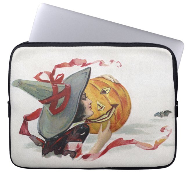 The Witch's Kiss: a Jack o Lantern on Halloween Laptop Sleeve (Front)