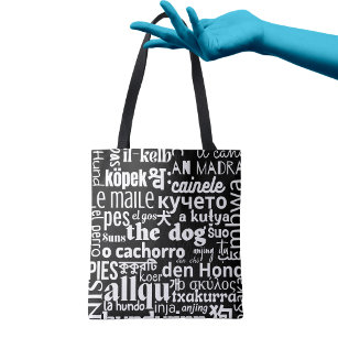 The word dog in various languages ​​black white tote bag