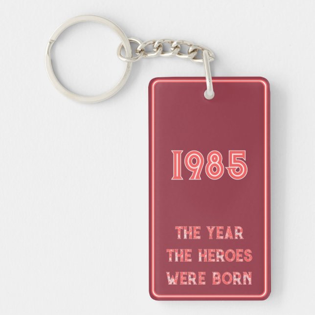 The Year The Heroes Were Born (red on maroon) Keychain (Front)