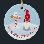 The Year we Stayed Home 2021 Gnome Christmas Ceramic Ornament<br><div class="desc">This design may be personalized in the area provided by changing the photo and/or text. Or it can be customized by choosing the click to customize further option and delete or change the color of the background, add text, change the text color or style, or delete the text for an...</div>