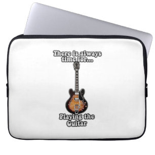 There is always time for playing the guitar. retro laptop sleeve
