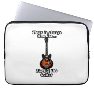 There is always time for playing the guitar. retro laptop sleeve