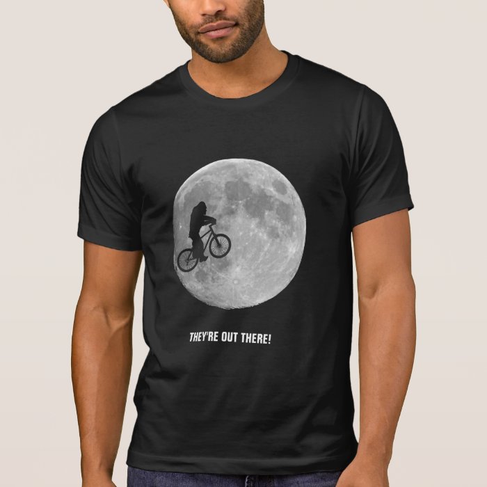 They're out there Bigfoot riding bike across moon Shirts