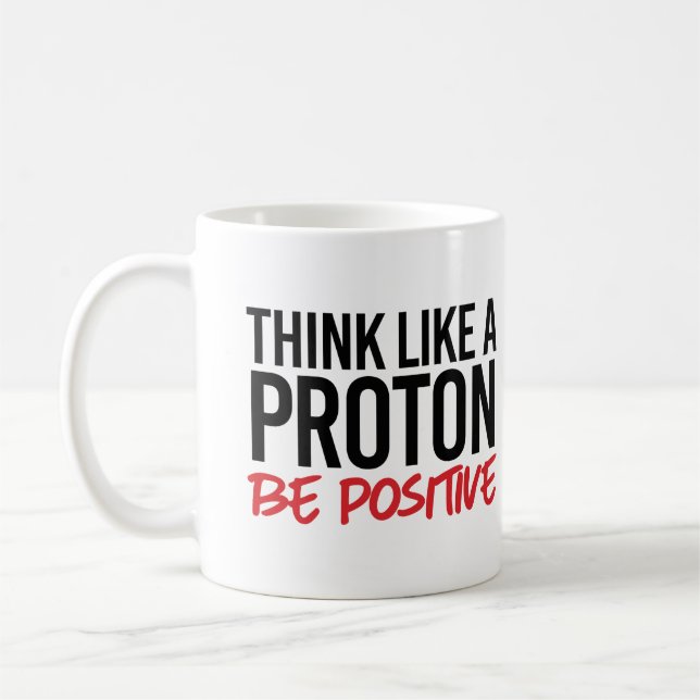 Think like a proton be positive coffee mug (Left)