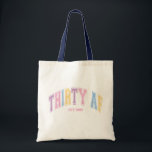 Thirty AF Custom Funny Turning 30 Birthday Tote Bag<br><div class="desc">Celebrate the big 30 in style with this funny "Thirty AF" t-shirt! Featuring a custom birth year, this retro-inspired design makes the perfect birthday gift for her. The collegiate-style font with bold, colorful letters adds a nostalgic touch, Comfy, trendy, and full of attitude—because turning 30 is a vibe! Rock your...</div>