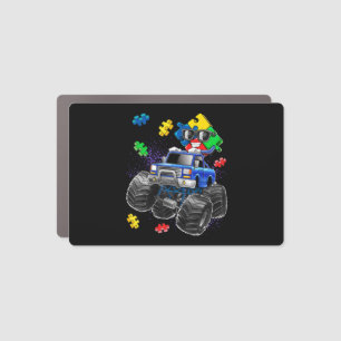 This autism awareness top features a puzzle piece car magnet