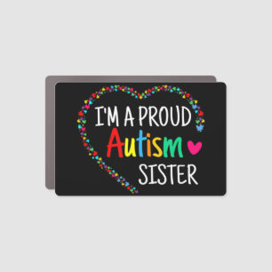 This colorful autism heart made with puzzle pieces car magnet