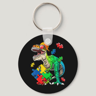 This dinosaur autism awareness top features a dino keychain