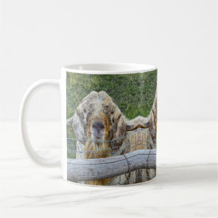 This friendly farm goat is looking at you. coffee mug