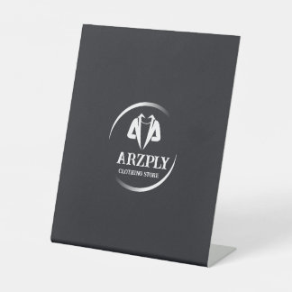 This is white and gray cloth store logo. pedestal sign