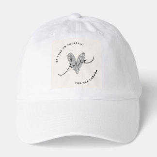 This minimalist cap features a glitter-style heart