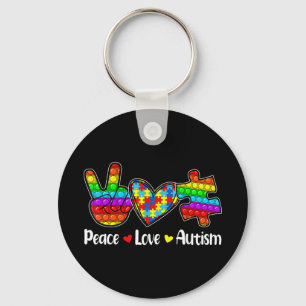 This Novelty Poppin With Sayings "Peace Love Autis Keychain