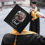 This One Is For You Dad Graduation Cap Topper<br><div class="desc">Looking for a heartfelt way to honor a loved one who wasn't able to witness your graduation? Look no further than this elegant memorial graduation cap topper. Featuring a cherished photo and customizable text that reads "THIS ONE IS FOR YOU, DAD" this modern topper is a touching tribute. Personalize it...</div>