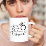 This Ring Make Me Look Engaged Coffee Mug<br><div class="desc">This cute engagement mug is the perfect gift for your soon to be spouse! It features a diamond ring and a funny saying that reads, "Does this ring make me look engaged?". You can give the mug to your loved one in a gesture of eternal love and commitment, making it...</div>