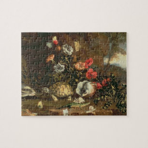 Thistles, flowers, reptiles and butterflies beside jigsaw puzzle