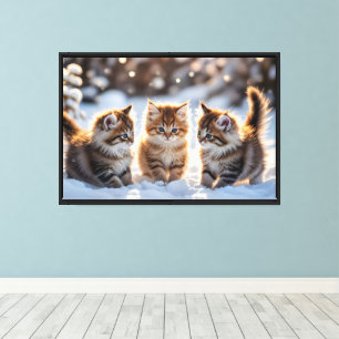Three adorable kittens playing in the snow, cute canvas print