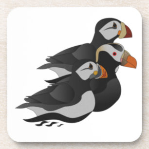 Three Adorably Friendly Puffins Swimming Cartoon Beverage Coaster