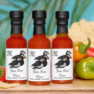 Three Adorably Friendly Puffins Swimming Cartoon Hot Sauces