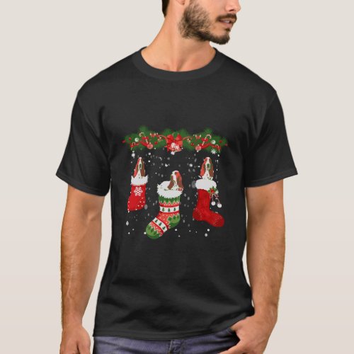 Three Basset Hound Dog In Sock Christmas Santa Hat T_Shirt