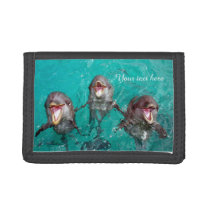 Three Beautiful dolphins playing in the ocean Trifold Wallet Three Beautiful dolphins playing in the ocean Trifold Wallet