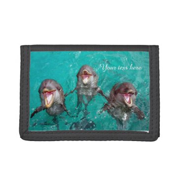 Three Beautiful dolphins playing in the ocean Trifold Wallet