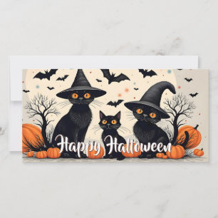 Three Black Cats with Hats on Halloween