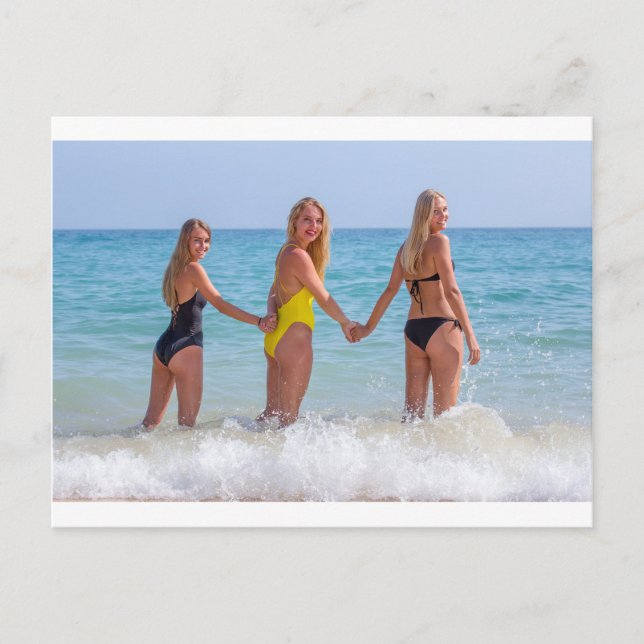 Three blond girls standing in sea.JPG Postcard (Front)