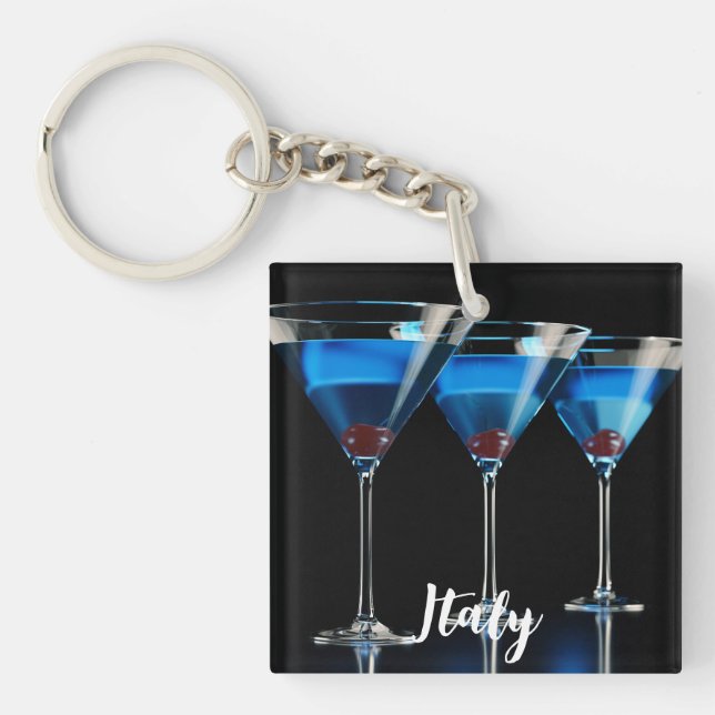 Three blue cocktails with cherry on black keychain (Front)