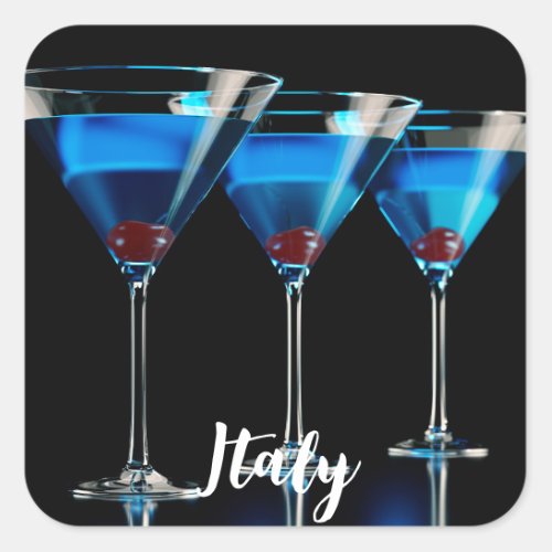 Three blue cocktails with cherry on black square sticker