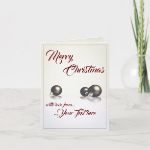 Three christmas balls in front of light background card