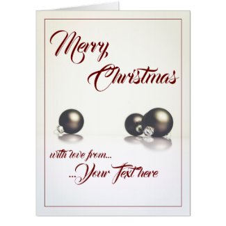 Three christmas balls in front of light background card
